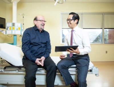 Oncologist Dr. Michael Ong of The Ottawa Hospital in a patient room.