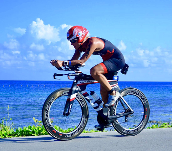 Sindy biking at the International Triathlon Union