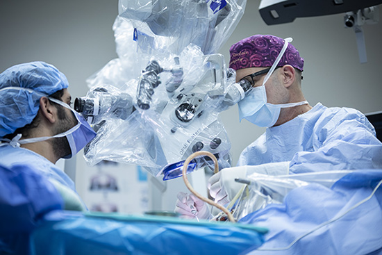 Dr. Sinclair in the neurosurgery operating room