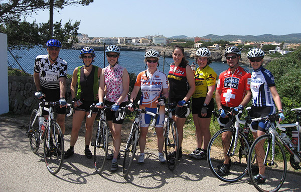 John, far left, with Nadia, with cycling group. fourth from right