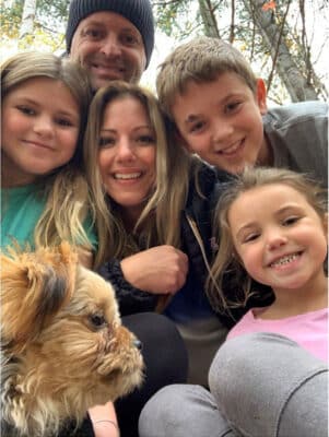 Gina Mertikas, centre, and her family