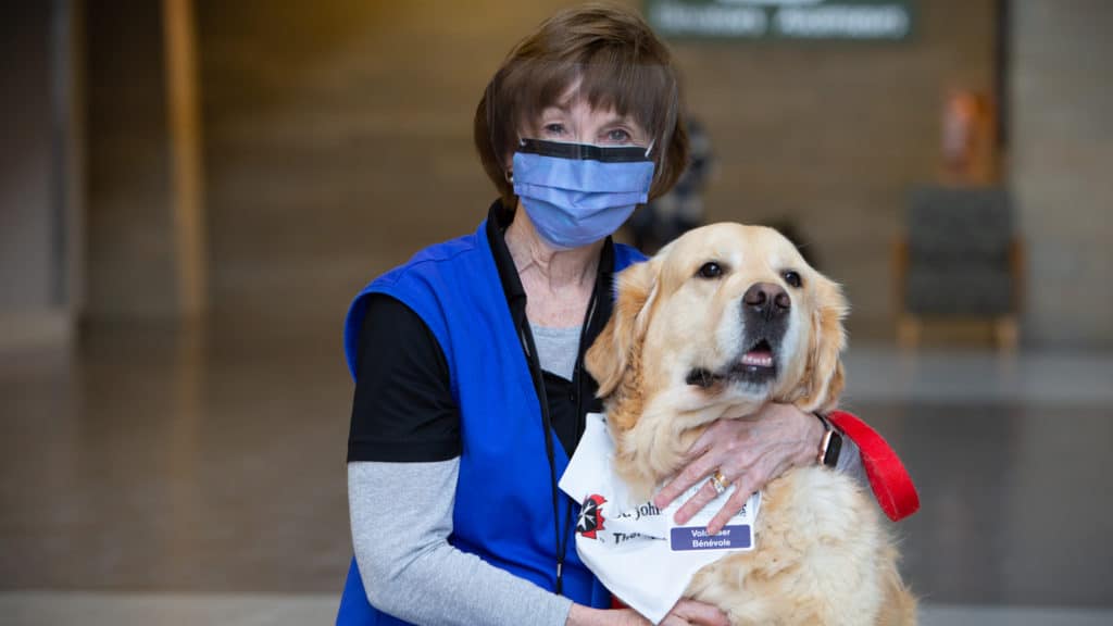 Joanne and Happy therapy dog team