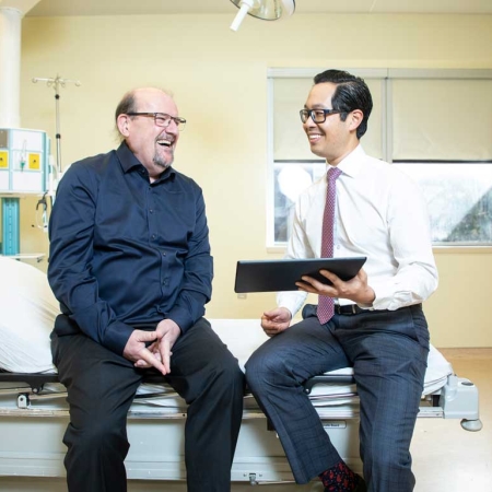 Oncologist Dr. Michael Ong of The Ottawa Hospital in a patient room.