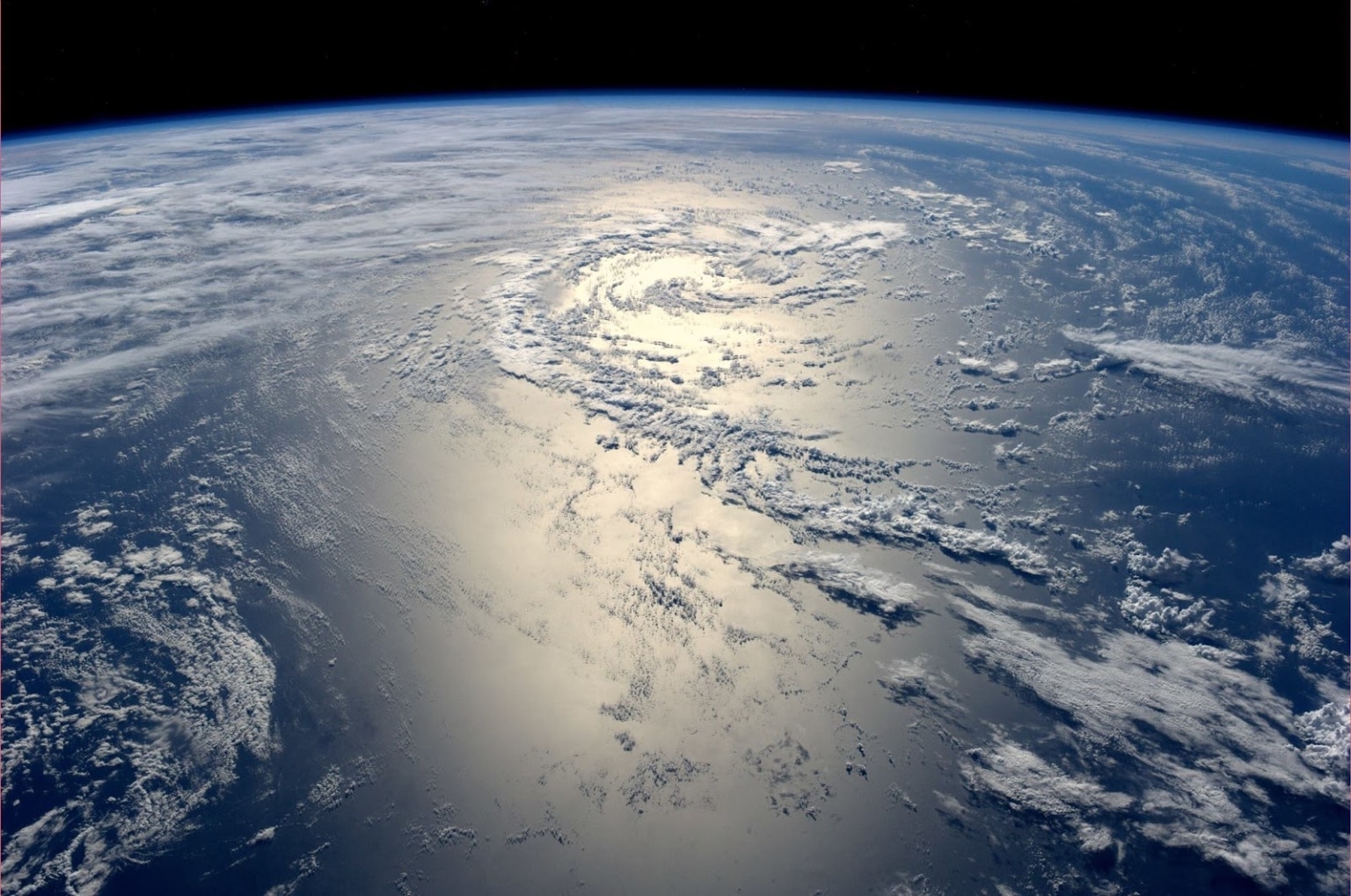 View from space Sun reflection off ocean